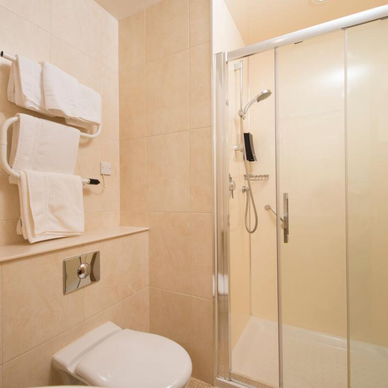 Highland Hotel bathroom with walk-in shower